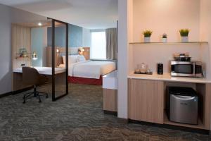 SpringHill Suites by Marriott East Lansing University Area, Lansing Area客房内的一张或多张床位