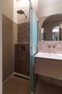 a bathroom with a shower and a sink at POINT BEACH beige in Valencia