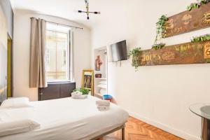 Postel nebo postele na pokoji v ubytování Apartments Chic Torino Centro porta nuova
