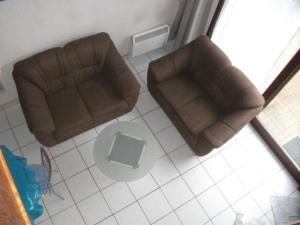 an overhead view of a living room with two chairs at Gemütliches und ruhiges Ferienhaus im Seebad Bredene aan Zee in Bredene