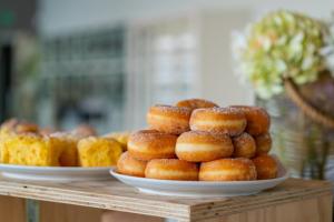 a pile of donuts sitting on top of a table at Arribas Sintra Hotel in Sintra
