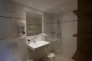 Koupelna v ubytování Matschun Appartements + 21 fotografií