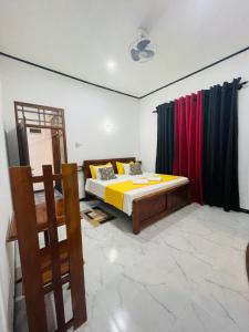 Postel nebo postele na pokoji v ubytování Bliss Inn