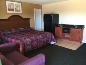 En eller flere senger på et rom på La Vista Inn