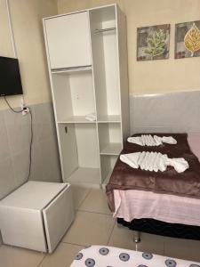Postel nebo postele na pokoji v ubytování Pousada Sapê