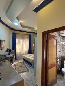 Postel nebo postele na pokoji v ubytování Sababa Hotel