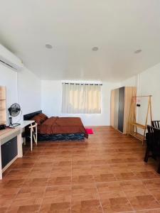Ένα ή περισσότερα κρεβάτια σε δωμάτιο στο Sandy house Pai