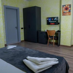 Postel nebo postele na pokoji v ubytování Avrasya Inn Hotel