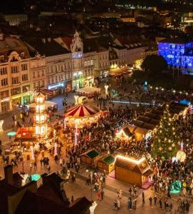 an overhead view of a christmas market at night at Hej Bydgoszcz - Apartament XL na Starym Rynku in Bydgoszcz