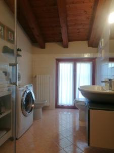 Kuchyň nebo kuchyňský kout v ubytování Quadrisfera Apartment