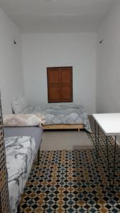 Llit o llits en una habitació de Riad Mtamer, Tetouan