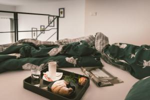 Voodi või voodid majutusasutuse "Hunter's Suite"- at the heart of Hartberg I Parking toas