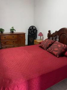 Postel nebo postele na pokoji v ubytování Alta vista casa de campo Tanti