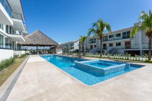 an image of a swimming pool at a resort at El Tigre Resort, Quinta San Miguel in Nuevo Vallarta 