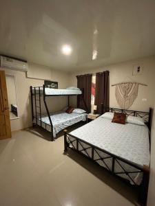 Ένα ή περισσότερα κρεβάτια σε δωμάτιο στο Agutí Apartment