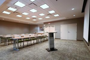 a large room with a long table in it at Springhill Suites by Marriott San Antonio Alamo Plaza/Convention Center in San Antonio +16 photos