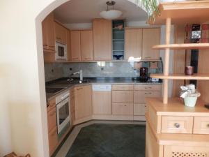 Kuchyň nebo kuchyňský kout v ubytování Apartment Kerer