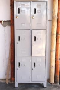 a group of white storage cabinets in a room at Wally's House Mancora in Máncora