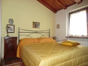 Postel nebo postele na pokoji v ubytování B&B Isonzo
