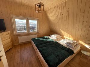 Postel nebo postele na pokoji v ubytování Apartament Maryna Pokoje Baciary
