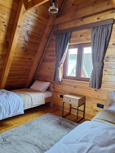 Postel nebo postele na pokoji v ubytování Valley of Dreams Žabljak