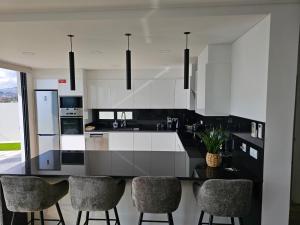 Η κουζίνα ή μικρή κουζίνα στο Bela Vista Funchal Villa