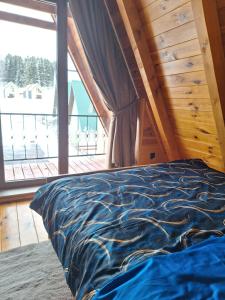 Postel nebo postele na pokoji v ubytování Valley of Dreams Žabljak