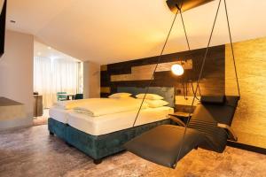 Łóżko lub łóżka w pokoju w obiekcie Mooshaus Winterresort