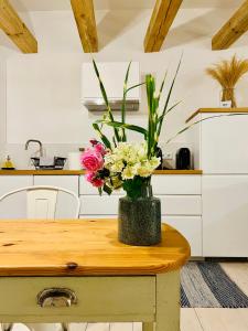 Kuchyňa alebo kuchynka v ubytovaní PM1-apartament