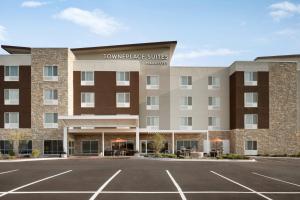 a rendering of the front of a hotel parking lot at TownePlace Suites by Marriott Joliet Minooka in Minooka