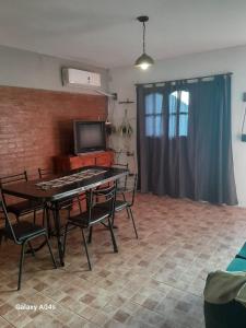 TV a/nebo společenská místnost v ubytování Mifauna