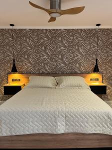 Postel nebo postele na pokoji v ubytování Bellamontagna Suites + 23 fotografií