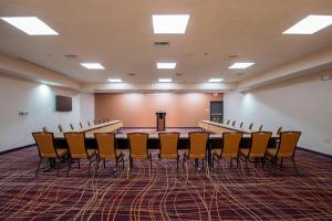 a conference room with a long table and chairs at SpringHill Suites by Marriott San Antonio Downtown-Riverwalk Area in San Antonio +24 photos