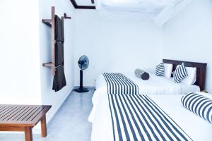 Postel nebo postele na pokoji v ubytování Dawn View Home Stay