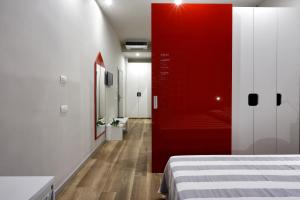 Postel nebo postele na pokoji v ubytování Hotel Aurea