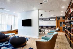 TV a/nebo společenská místnost v ubytování Sheraton Santos Hotel