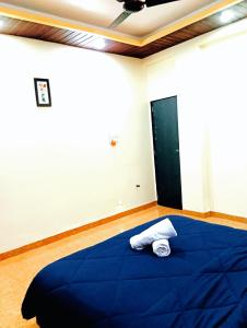 Postel nebo postele na pokoji v ubytování Kavyam Villa