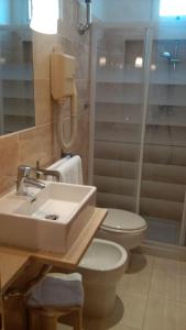 Koupelna v ubytování Hotel Touring