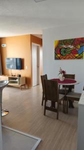 Μια τηλεόραση ή/και κέντρο ψυχαγωγίας στο Appartement tout confort au bord de mer +26 φωτογραφίες