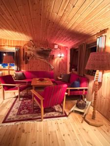 Posezení v ubytování Aurora Haven - With jacuzzi