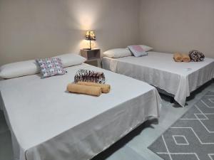 Ένα ή περισσότερα κρεβάτια σε δωμάτιο στο Quarto Família privado, piscina aquecida, garagem, etc