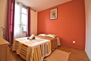 Postel nebo postele na pokoji v ubytování Sweet Escape Goussainville + 8 fotografií