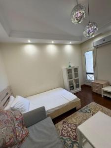 Postel nebo postele na pokoji v ubytování Apartment in New Cairo