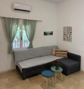 Area soggiorno di Golden Horizon Retreat, tranquil atmosphere next to the sea!