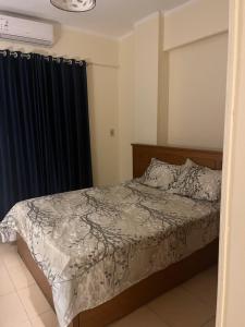 Postel nebo postele na pokoji v ubytování Central Hurghada Apartment