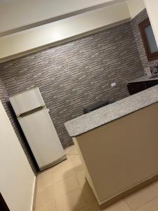 Kuchyň nebo kuchyňský kout v ubytování Central Hurghada Apartment