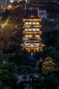 a large building with lights on the side of it at The Westin Hefei in Hefei