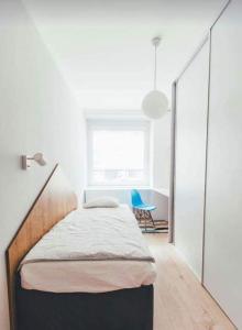 Postel nebo postele na pokoji v ubytování 2BR Apartment awarded for Best Renovation & Design