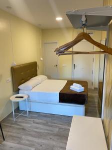 Postel nebo postele na pokoji v ubytování Hostal Oliver
