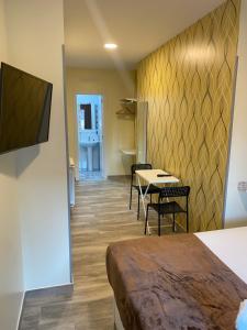 TV a/nebo společenská místnost v ubytování Hostal Oliver